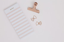 notebook and paper clips 