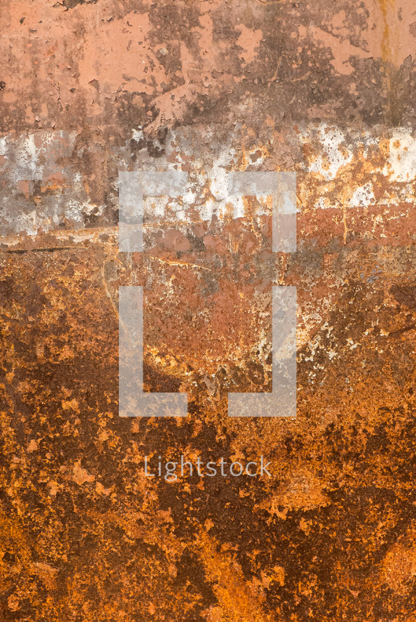 rusty surface background in orange, brown and white