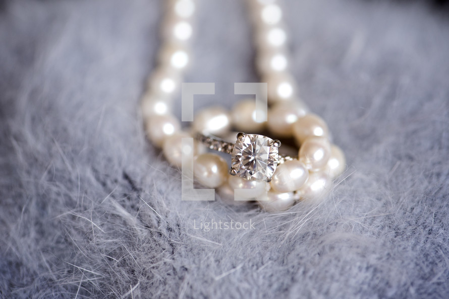 pearl necklace and diamond ring 