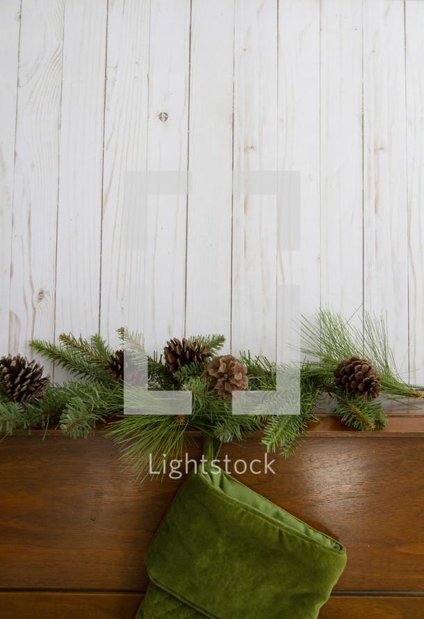 white wood background and hanging stocking 