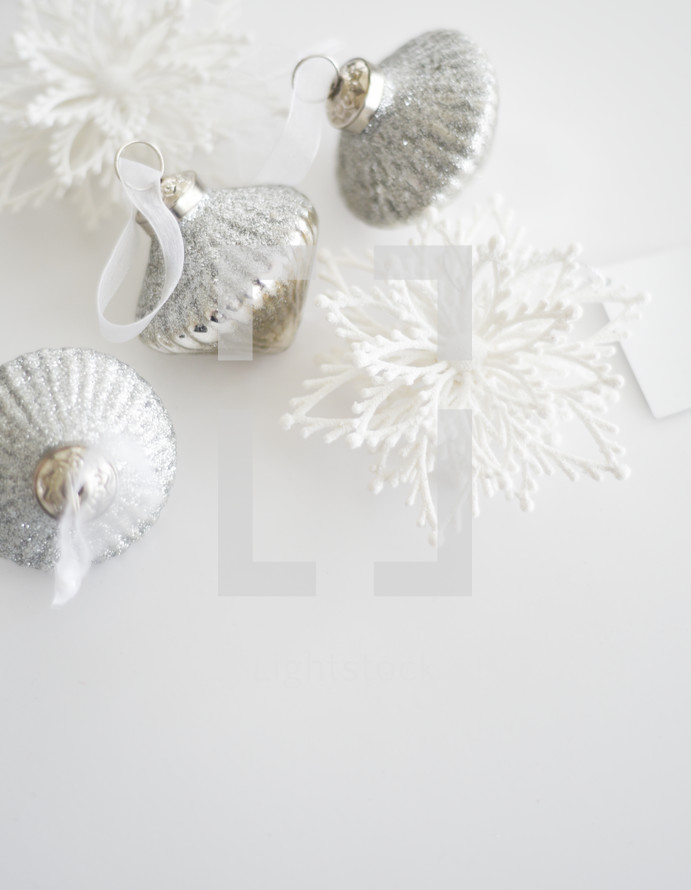 silver and white Christmas ornaments 
