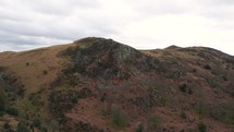 Hill with rock face, Pull back