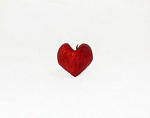 Red apple shaped like a heart.