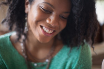 An African American woman smiling 