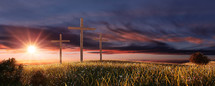 Resurrection and three crosses at sunrise 