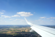 wing of a plane in flight 