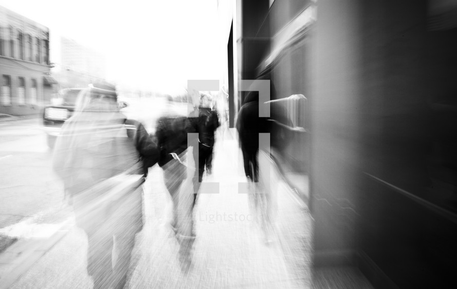 blur of passing pedestrians