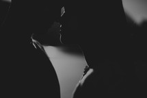 closeup of a couple kissing 