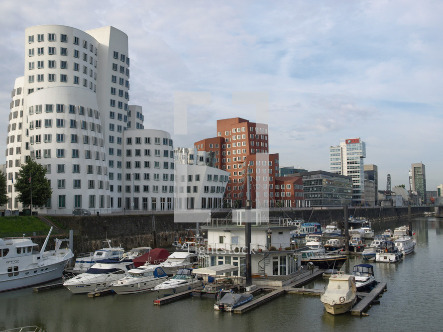 DUESSELDORF, GERMANY - AUGUST 03, 2009: The new Medienafen is a redevelopment area in the former docklands and harbour with buildings designed by Steven Holl, David Chipperfield and Frank O Gehry