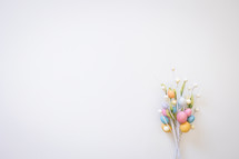 Sprig of easter eggs on a white background 