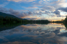 Cloudy sunset over Reflection's Lake in Palmer Alaska