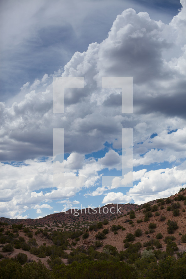 clouds over a hill 