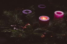 Rustic advent wreath with one candle lit