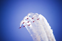 red arrows with trails 