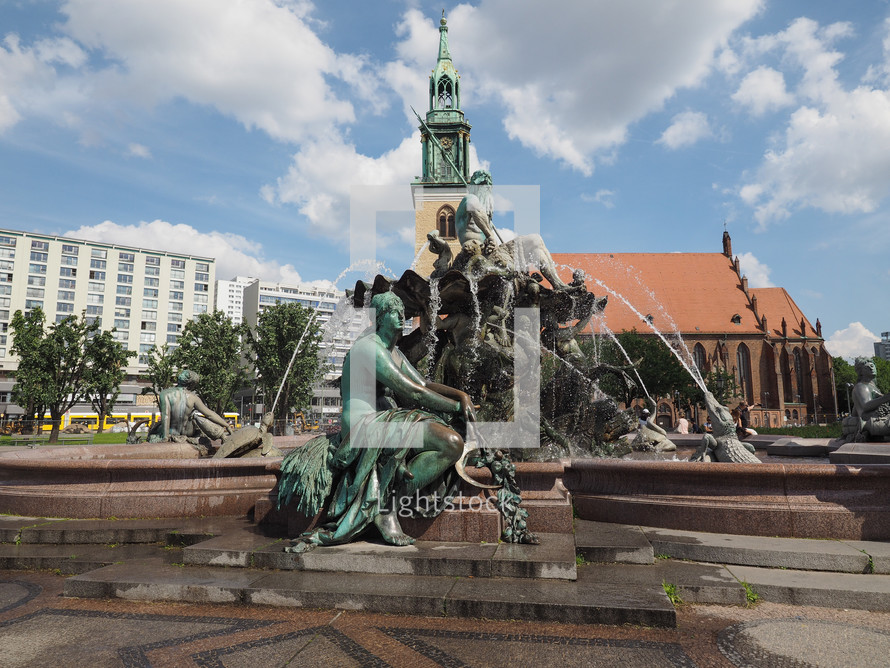 BERLIN, GERMANY - CIRCA JUNE 2016: Neptunbrunnen meaning Neptune fountain in Alexanderplatz