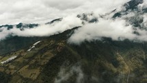 Tungurahua Stratovolcano Shrouded By White Clouds In Cordillera Oriental Of Ecuador. - wide	