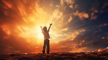 Child raising hands to a vivid sky