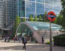 LONDON, UK - JUNE 10, 2015: Travellers at Canary Wharf underground station