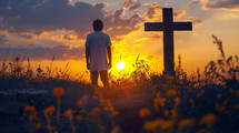 Man from behind in front of old wooden cross
Man in front of old wooden cross at sunset. Christianity and worship concept.