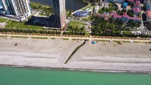 Beach and skyscraper construction in Batumi