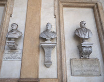 TURIN, ITALY - CIRCA AUGUST 2021: Statues of Carlo Boucheron, Giovanni Plana and Michele Giuseppe Dionisio at Turin University circa XIX century by unknown artist