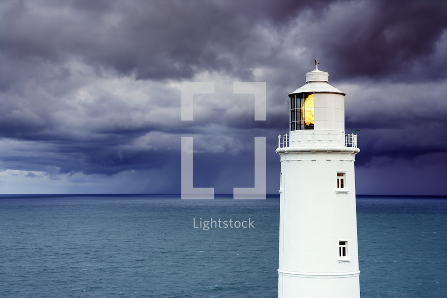 Lighthouse against a stormy sky
