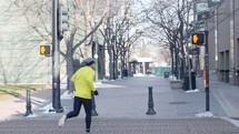 man running in a city 