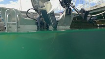 50/50 Over/Underwater Pan of Boat Hull with Outboard Engines, Dublin, Ireland
