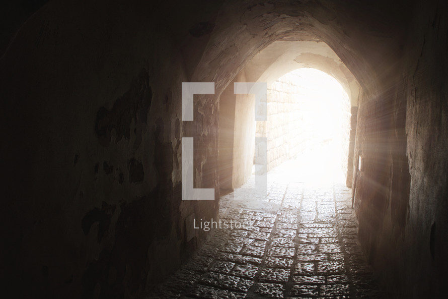 light  through stone tunnel