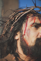 blood on the face of Christ 