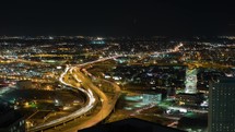 aerial view over Downtown Dallas highway at night 