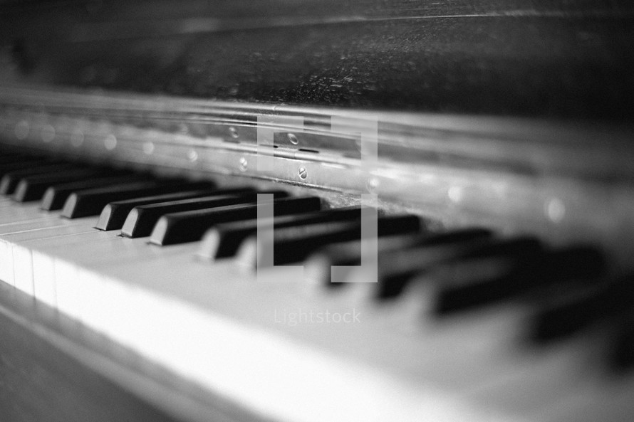 close up of acoustic piano keys, 