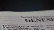 The book of Genesis with a star background
