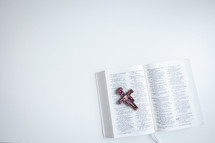 Bible and icon cross  on white background