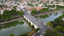 Traffic and bridge on the river