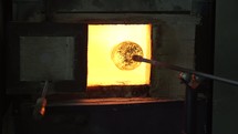 the art of glass blowing, glass in a furnace 