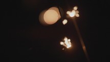bokeh light from a sparkler in darkness 