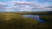 Aerial of lake and forest in northern Finland