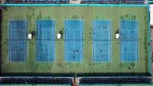 Players play on the tennis courts