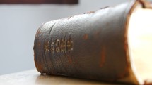 spine of a Japanese Bible on a desk 