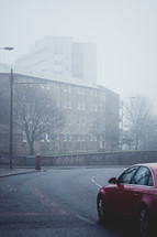 car driving on a foggy street in Glasgow 