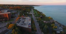 Petoskey Lake Michigan Aerial Sunrise Town Pull Back