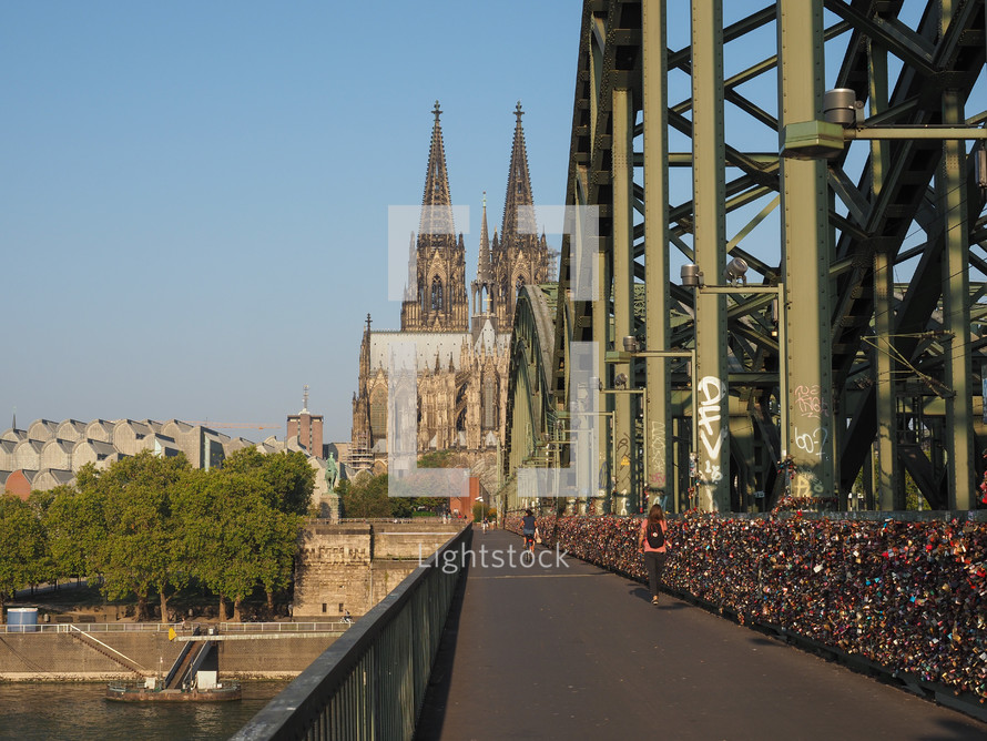 KOELN, GERMANY - CIRCA AUGUST 2019: Hohenzollernbruecke (meaning Hohenzollern Bridge) crossing the river Rhein