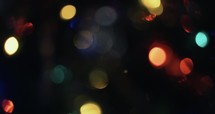 Abstract Christmas tree lights bokeh, blurred, holidays motion background.