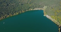 Aerial View Of Lake Sfanta Ana, Saint Anne Lake In Romania.- tilt down
