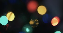 Abstract Christmas tree lights bokeh, blurred, holidays motion background.