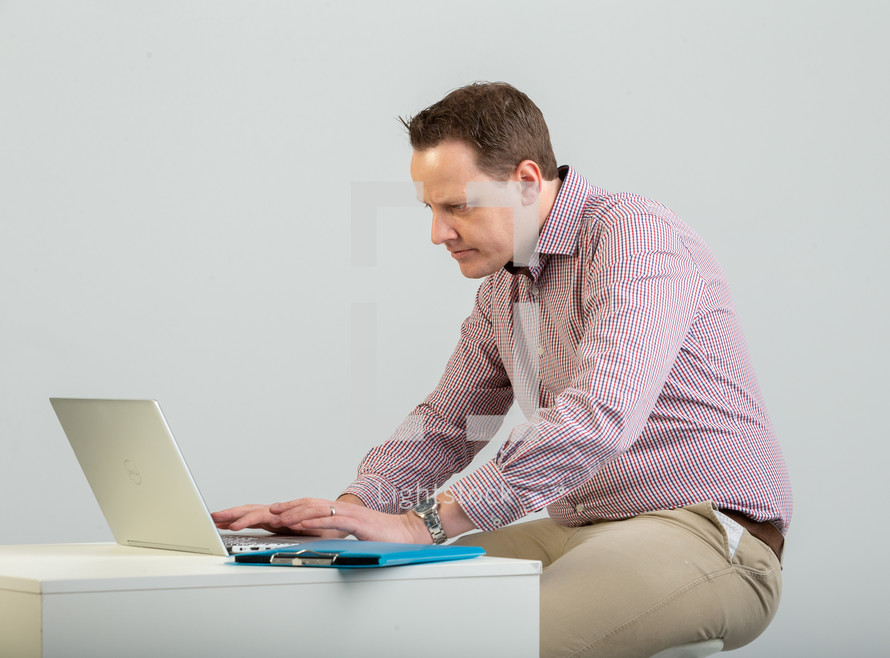 man using a laptop computer 
