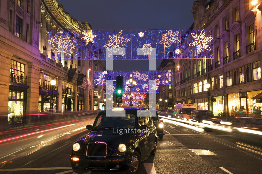 Taxi cab in Regent street at christmas. London, England.- for editorial use only 