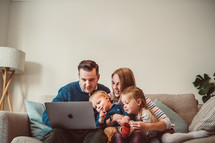 family watching a worship service online 