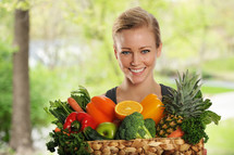 woman with a basket of fruits and vegetables 